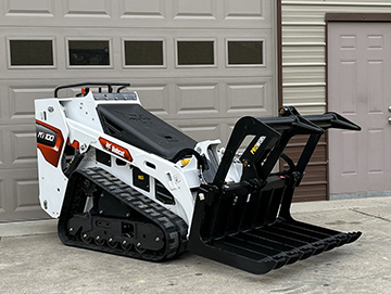 Mini skid steer rental in Fenton, Michigan